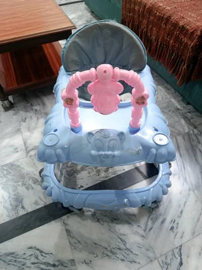 kids Walker available in neat and in proper working condition