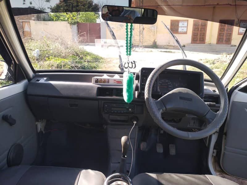 Suzuki Mehran 2015 - گھر کے استعمال کی صاف ستھری گاڑی 10