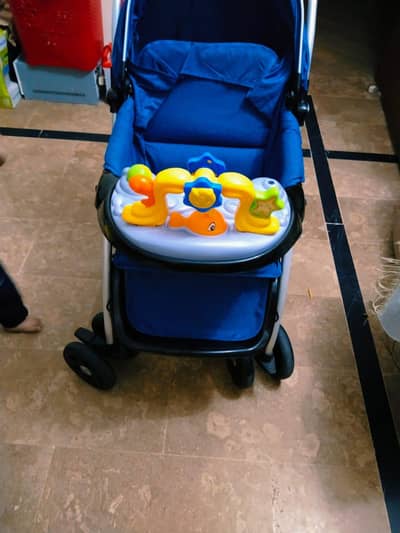 brand new pram stroller with toys and table both