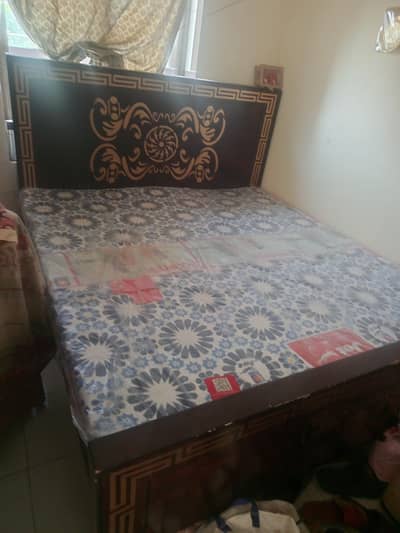 Double bed with side table and mirror