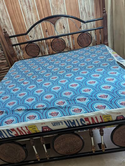 wooden bed with five star foam