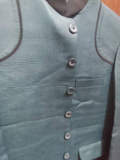 green pent coat good condition