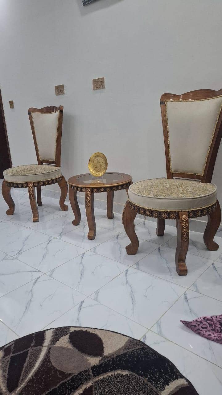 2 chairs with table 1
