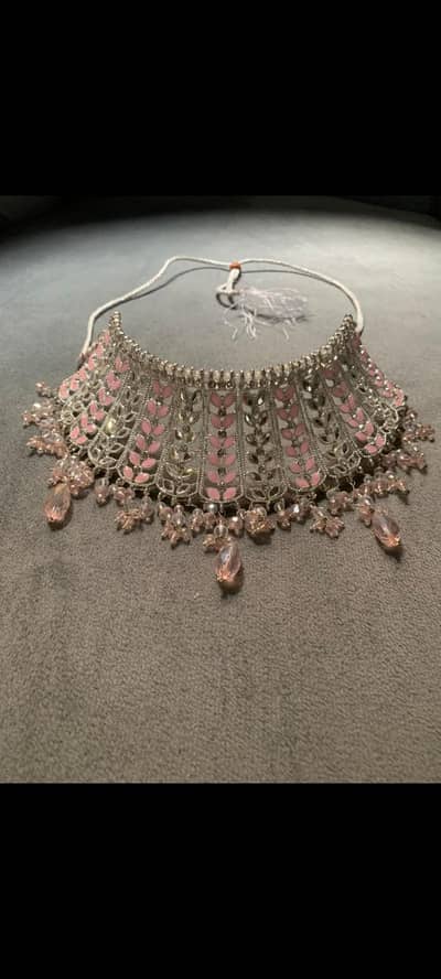 ​Graceful Pink Stone Embellished Heavy Bridal Choker set.