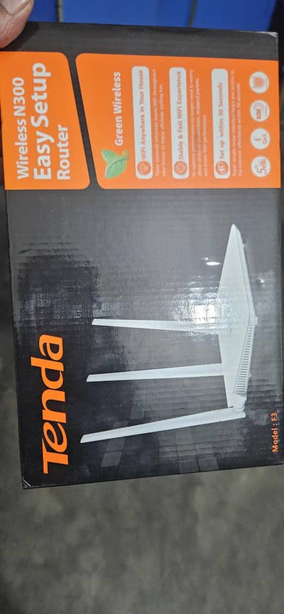 Tenda N300 router + extender good condition picks ma dekh sakte ha