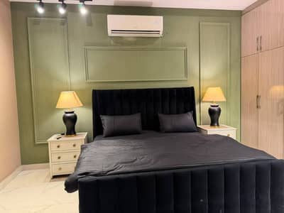 Daily Basis Apartment & Rooms Per day Perweek Short stay Available in E-11 Islamabad