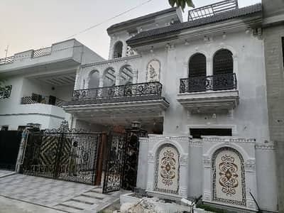 Prime Location 10 Marla House In Stunning Marghzar Officers Colony Is Available For sale