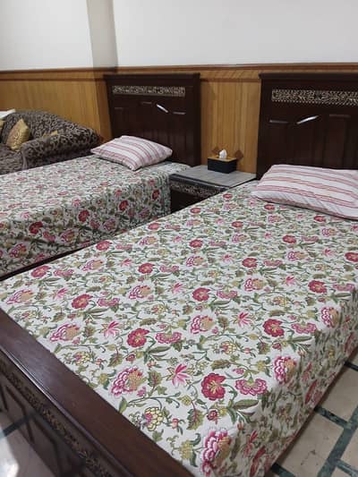 wooden single bed