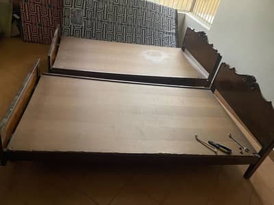 2 pure wooden single bed available good condition