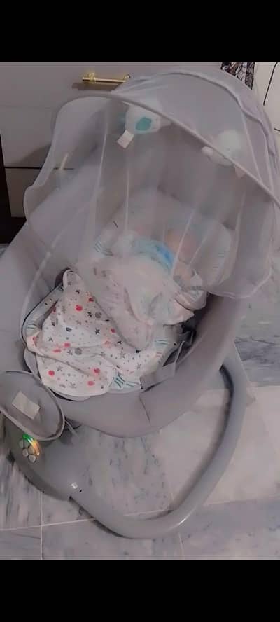 baby auto electric swing jhula remote control with music new condition