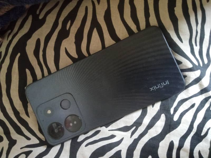 Infinix Smart 7 4