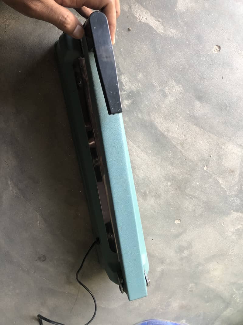 Shopper sealer machine 6