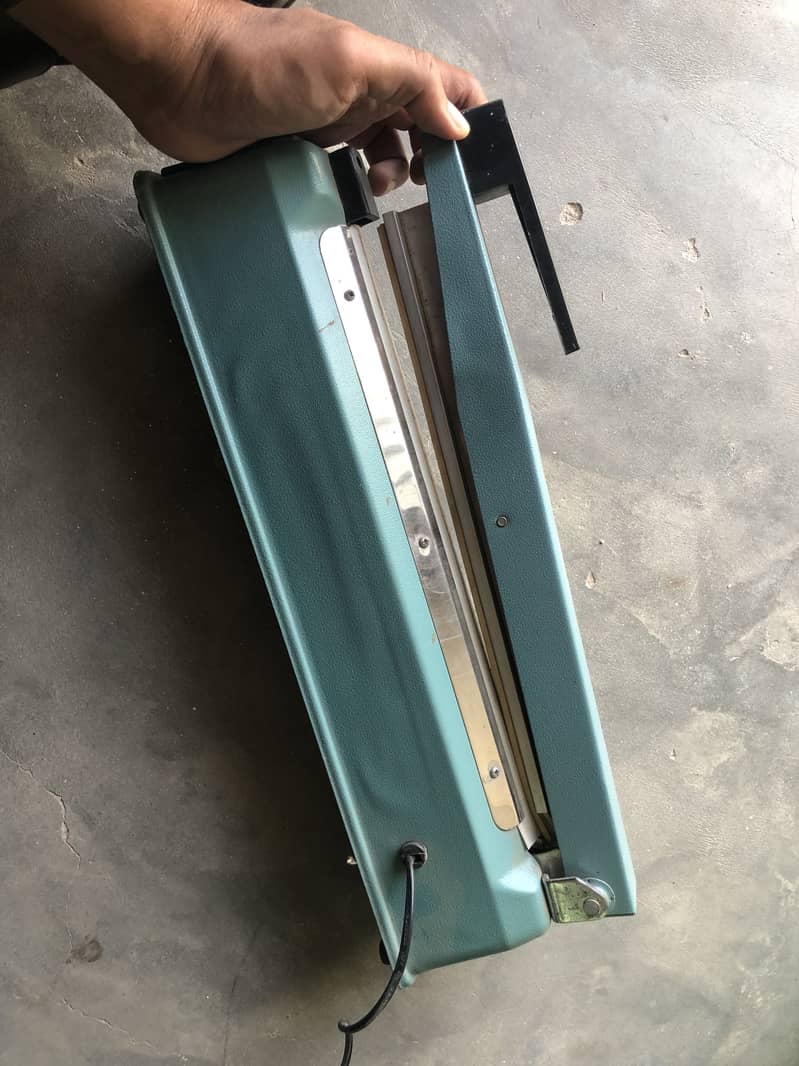Shopper sealer machine 7