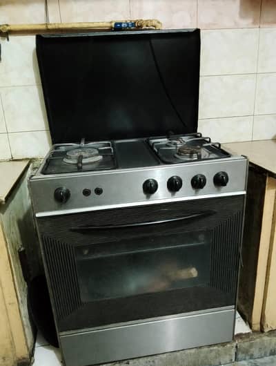 cooking range with electric and gas oven urgent sale (negotiable)