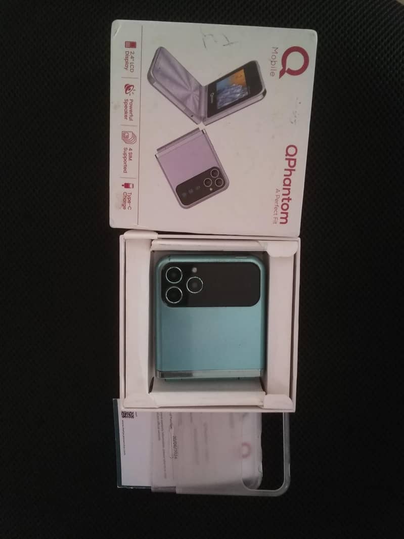 Q phantom foldable mobile 10/10 condition 0