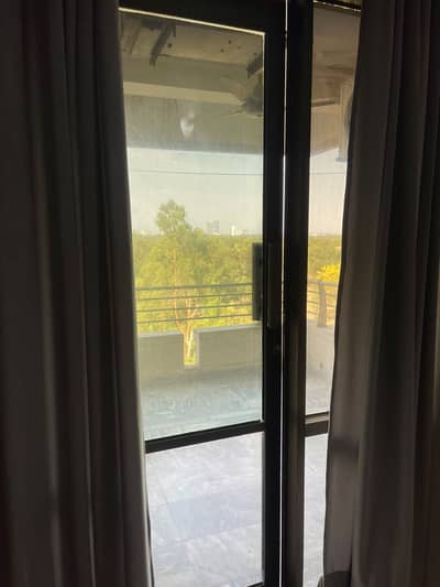 Very Beautiful Furnished Room Along with tv lounge and terrace available for rent in mustafa tower f10 markaz Islamabad.