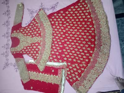 Red Bridal Lehenga with Heavy Golden Embroidery