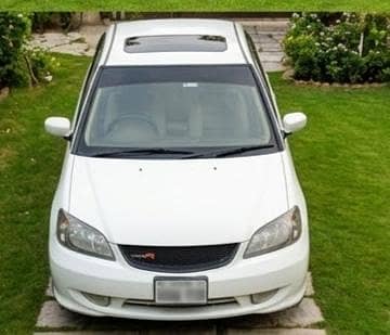 Honda civic 2004 vti oriel sunroof urgent sale home used.