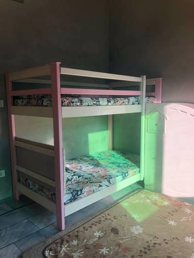 Wooden bunk bed with stairs