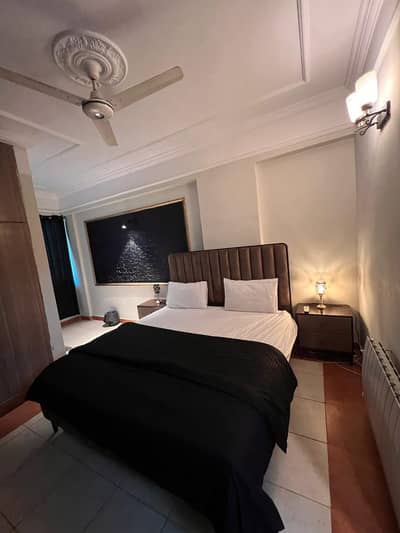 Daily Basis Apartment & Rooms Per day Perweek Short stay Available in E-11 Islamabad