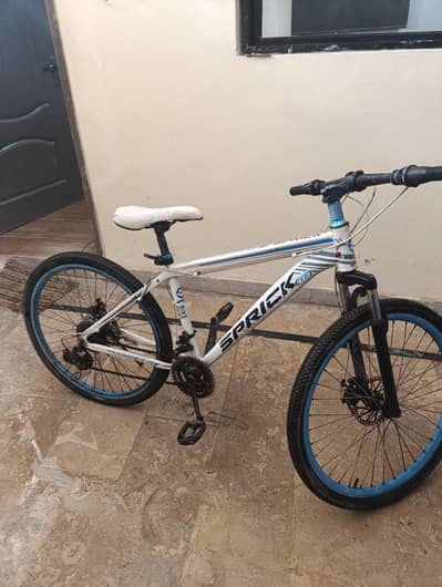 the bicycle is imported little bit rest on chain