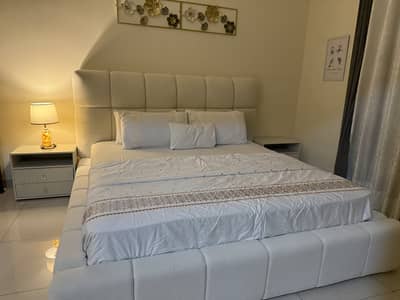 Off white bed set with 2 side tables and dressing table