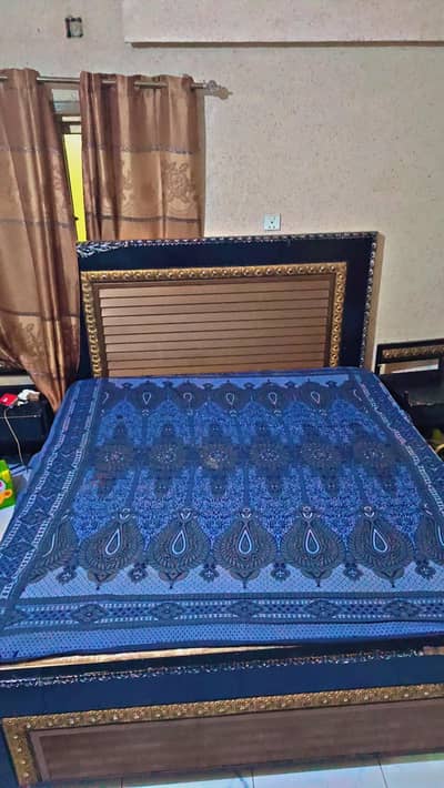 Metal Bed in 10 by 10 condition with 2 side table urgent slae