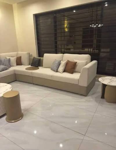 7 seater LShap Corner Sofa with cushions round table and 2 room chairs