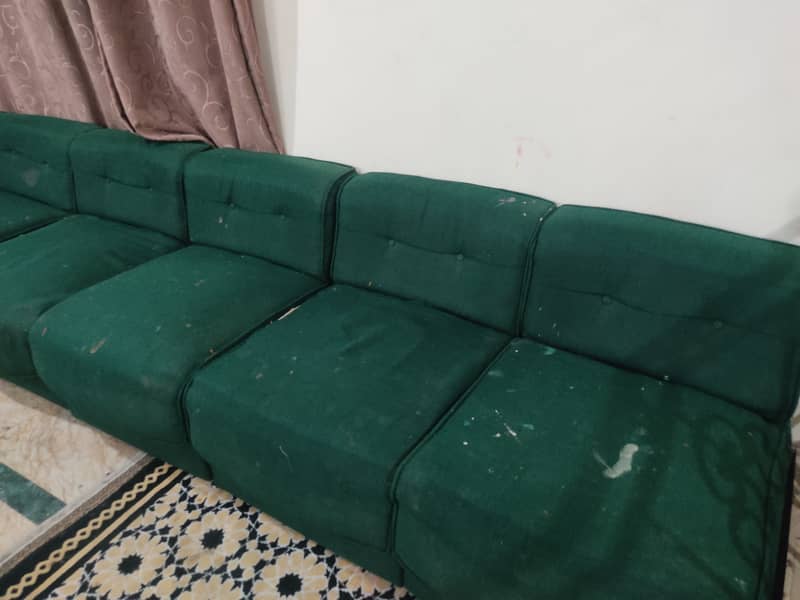 Dark green sofas 1