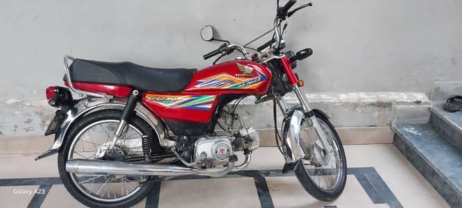Honda cd70 20 model in red
