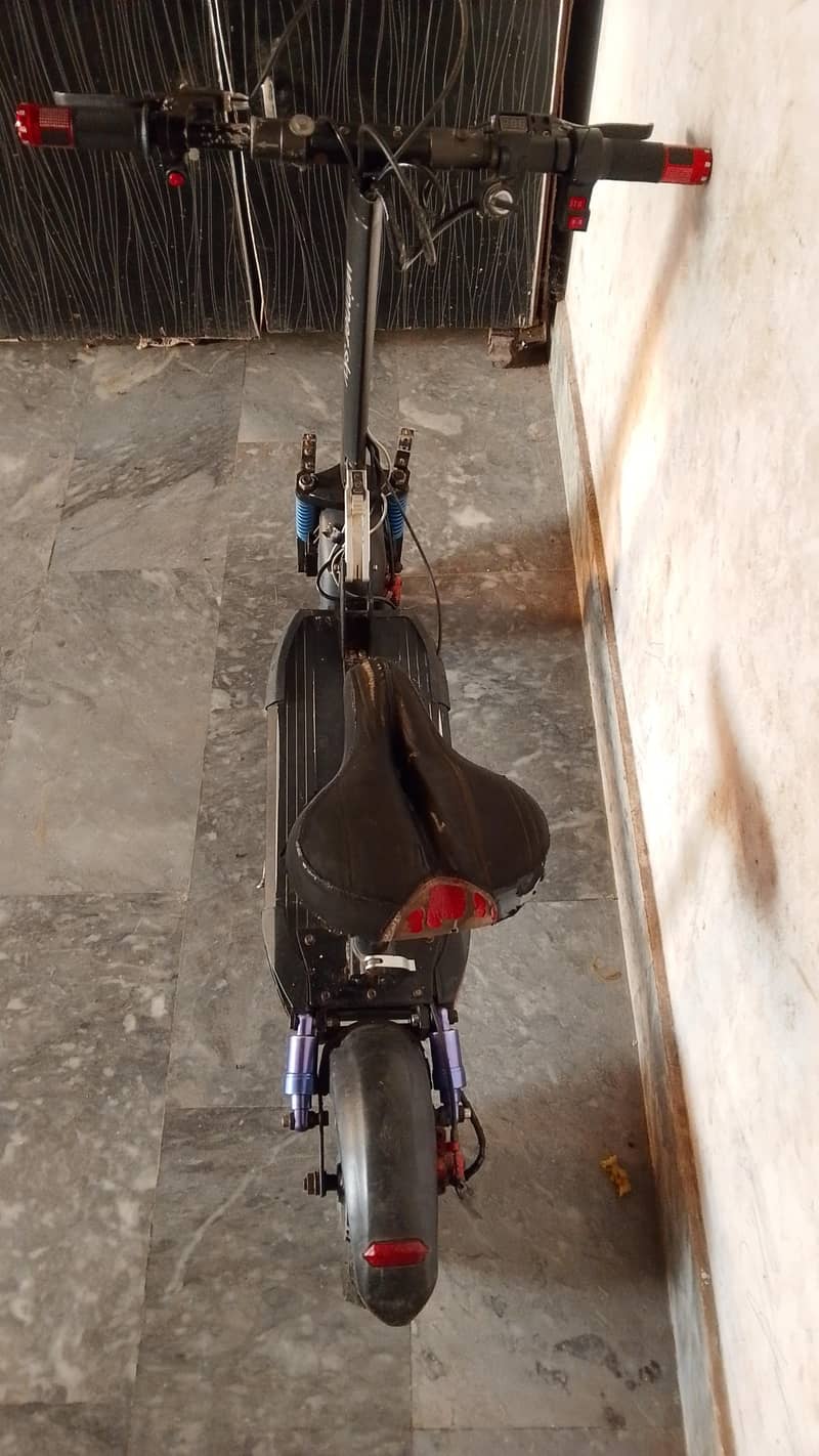 electric scooty range 1