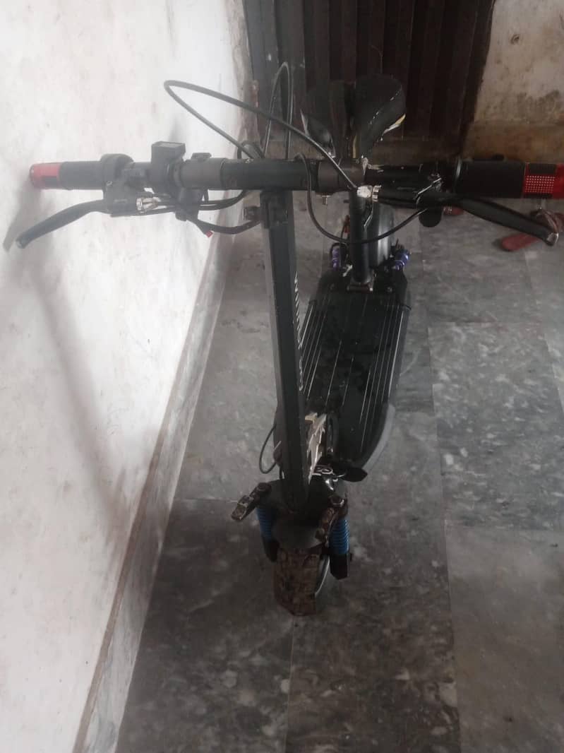 electric scooty range 5