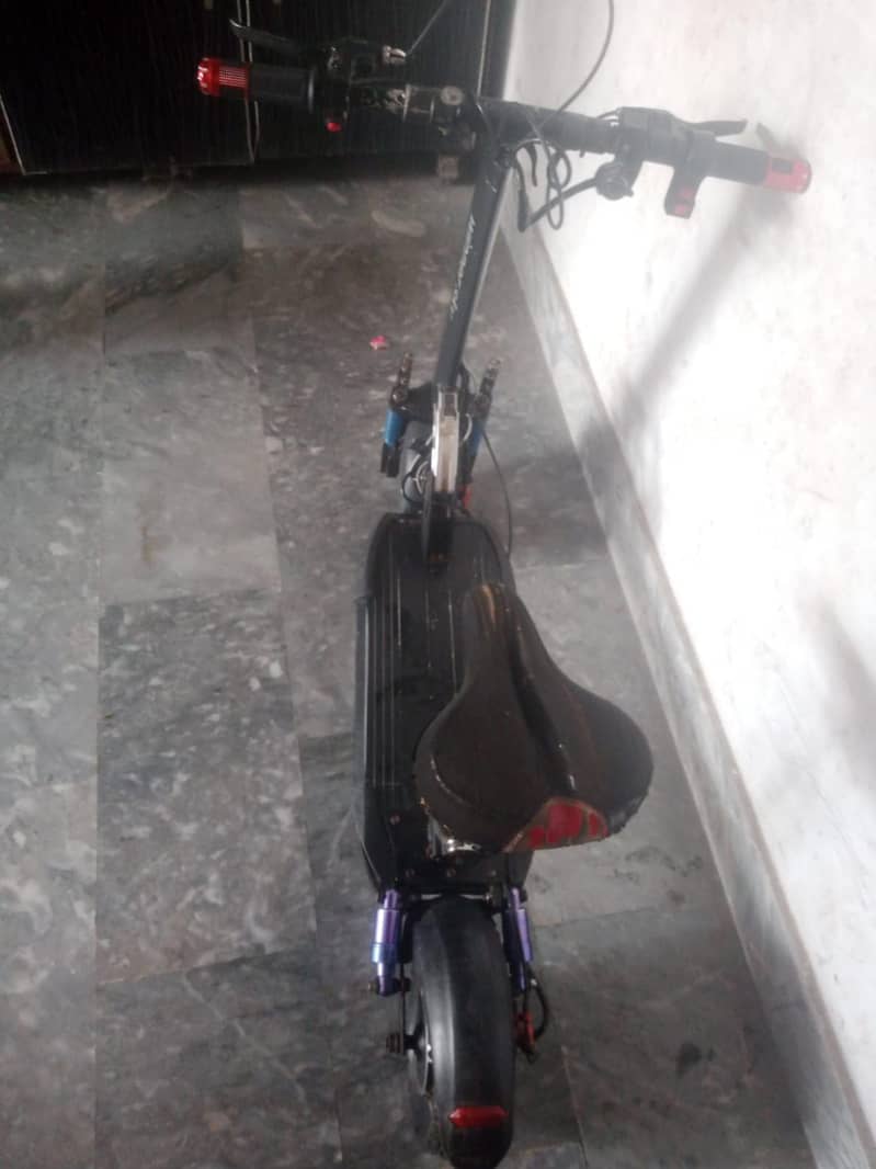 electric scooty range 6