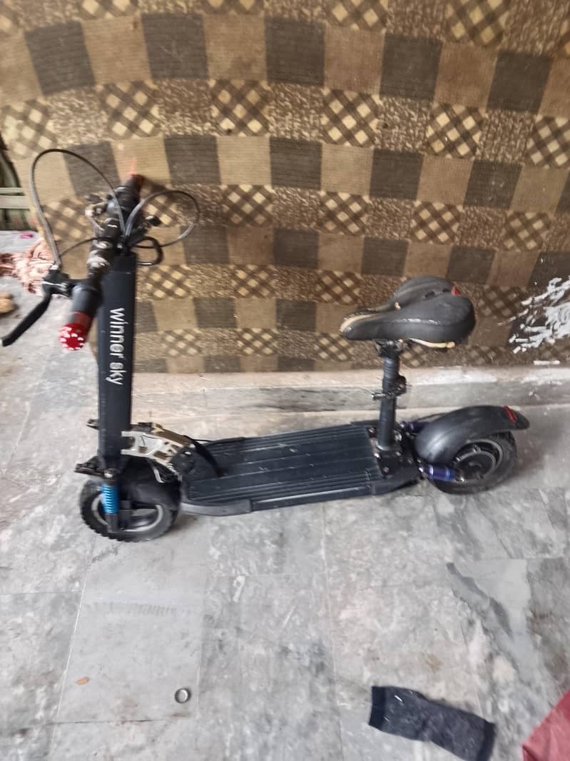 electric scooty range 7