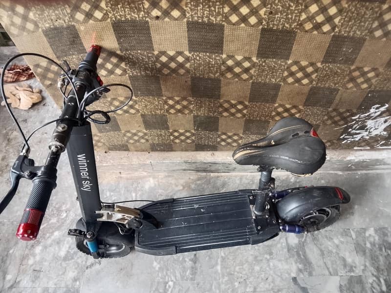 electric scooty range 8
