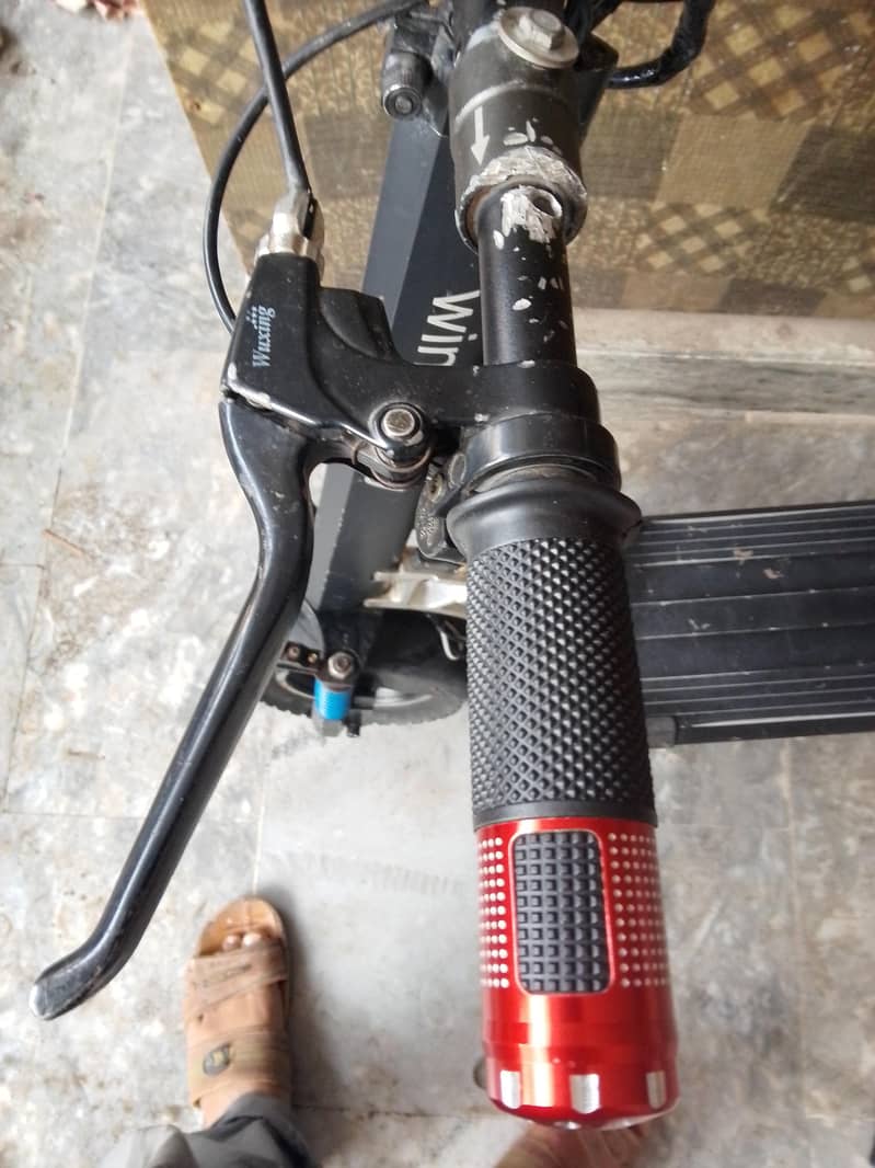 electric scooty range 9