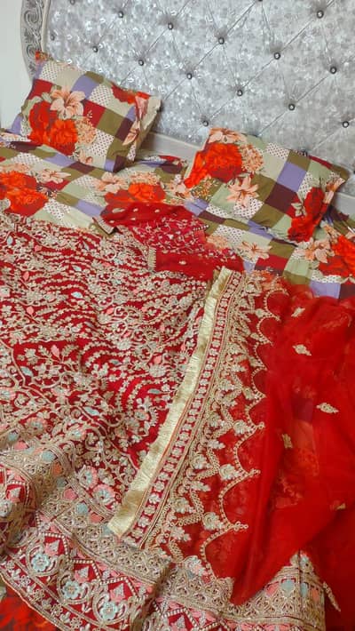 Beautiful Red Bridal Dress with Heavy Golden Embroidery