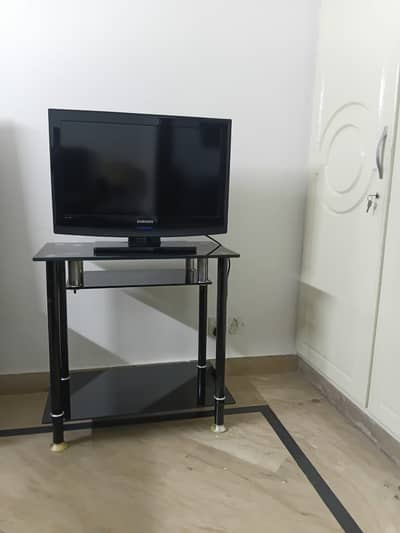 1 tv trolley and 1 lcd
