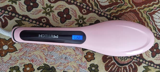 Hair straightener brush