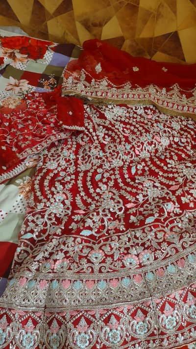 Beautiful Red Bridal Dress with Heavy Golden Embroide