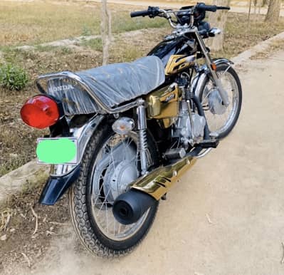 For Sale of Honda 125 Gold Edition and like as new condition