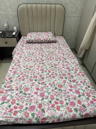 Single bed with side table and dressing  table