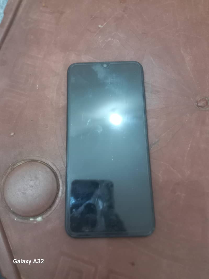 Redmi A2+ 1