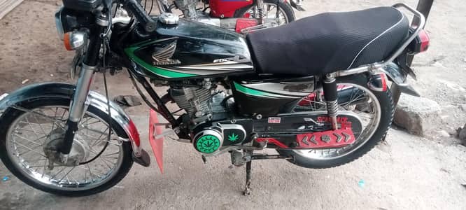 Honda 125 model 2013 location muzaffarabad 03169239366