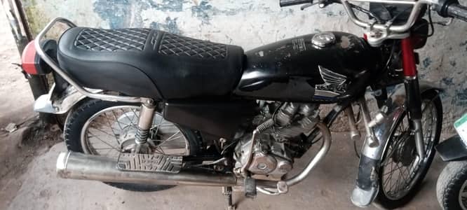 Honda 125 model 2005 Lahore number location muzaffarabad  03169239366.