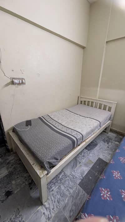 wooden beds with  diamond mattress and this bed is a twin
