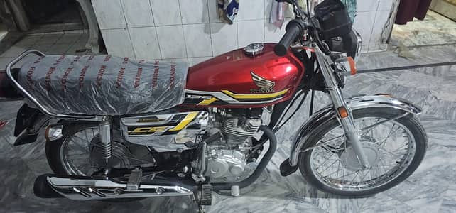 honda 125 self start 2026 sticker 27 ka number lga ha