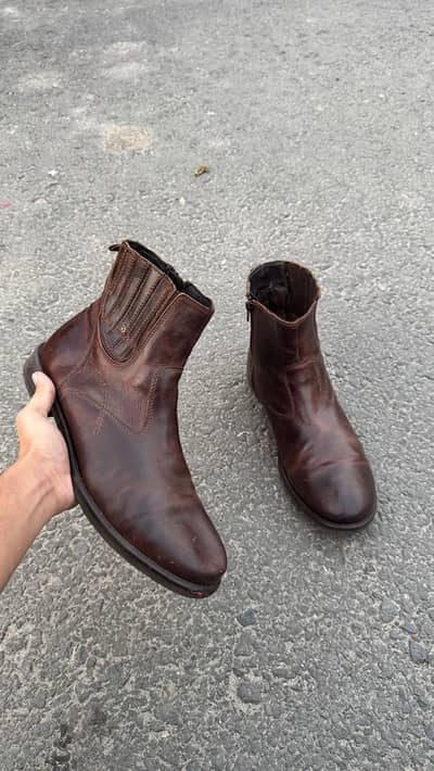 distressed brown leather side-zip ankle boots
