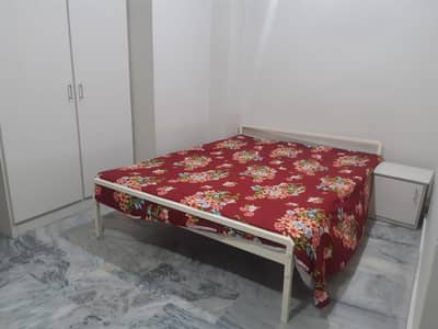Furnished Bedroom Available For Rent location Upper mall Near to Worlds Time's institute