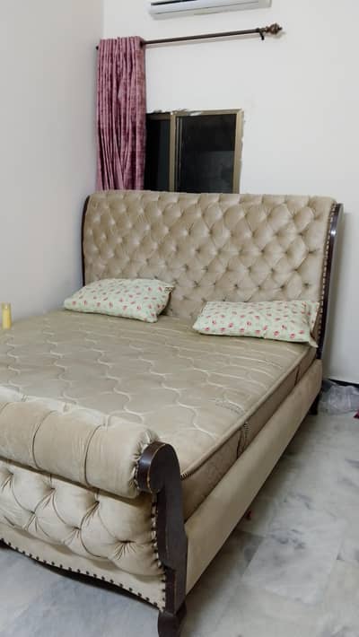 king size bed with side table . new cover
